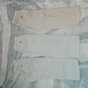 3 pairs of men  work "CARHARTT" pants sizes are 36x32